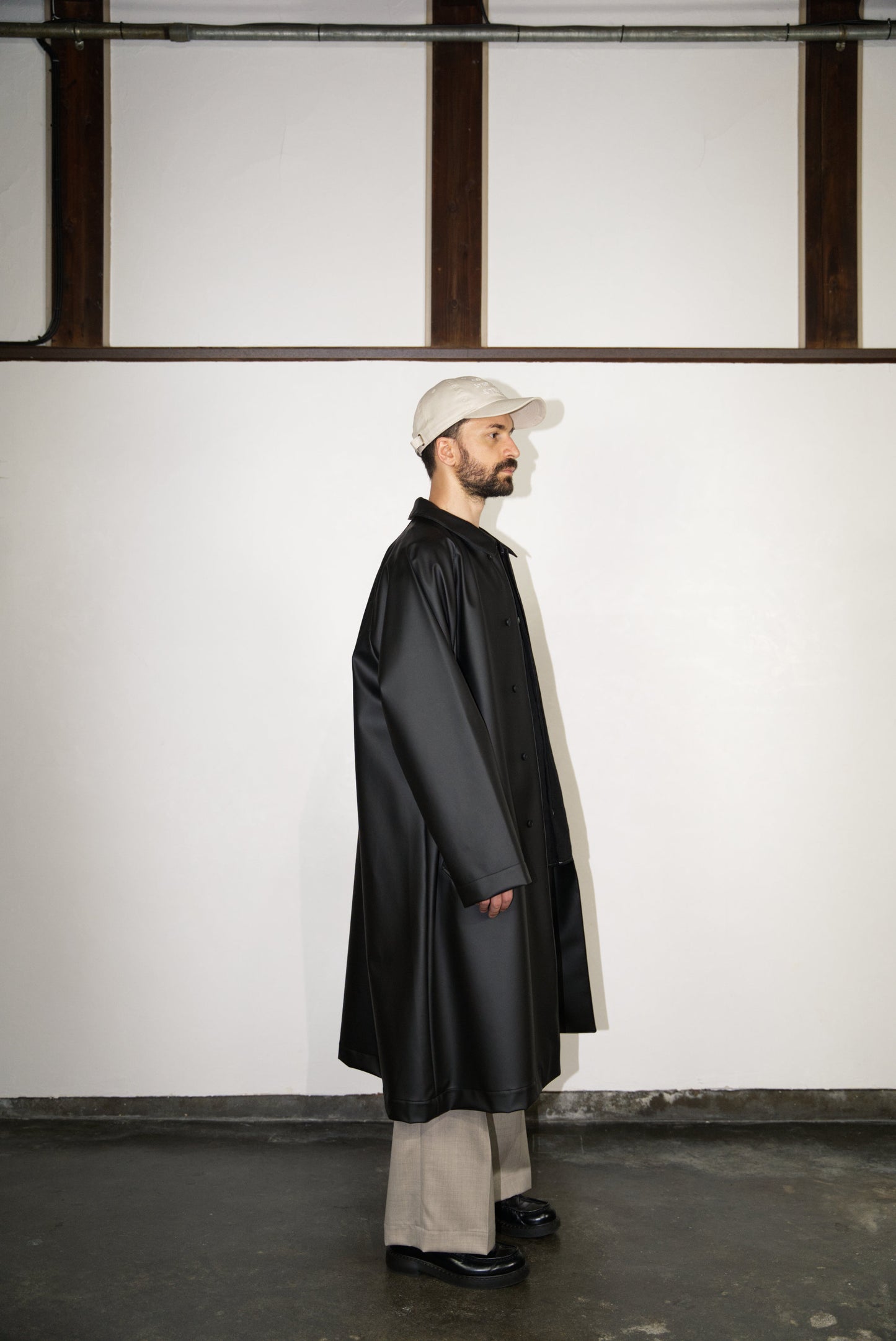matt black Bal Collar Coat in Cactus Leather from the side