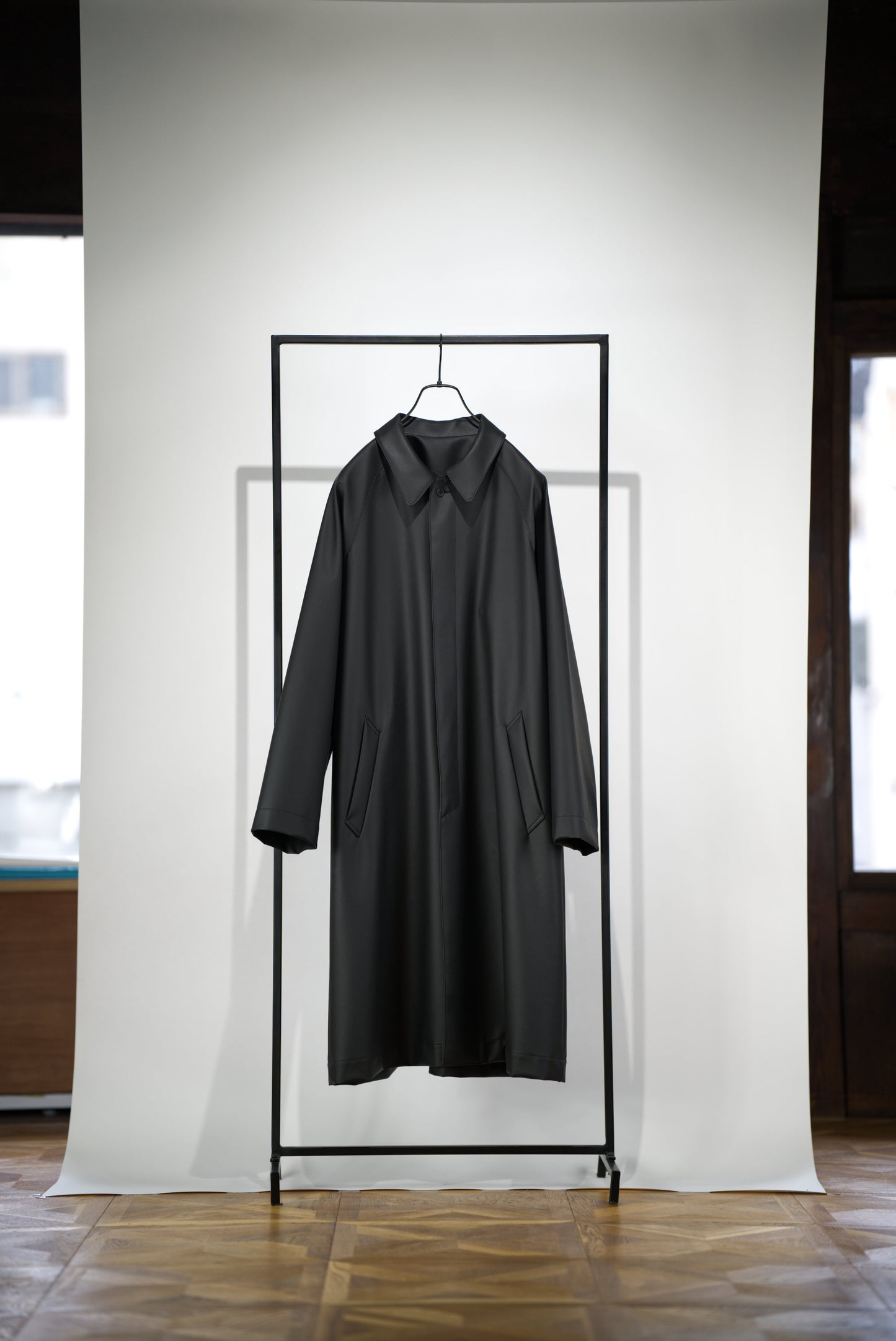 matt black bal collar coat in cactus leather with classic collar