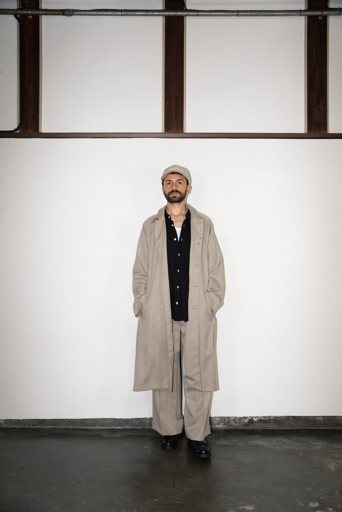 male model in the écru Bal Collar Coat in Wool