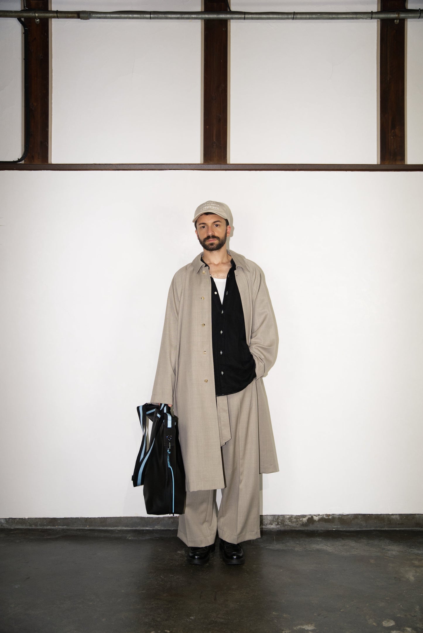 Belted Wide Flare Trousers in Wool on male model