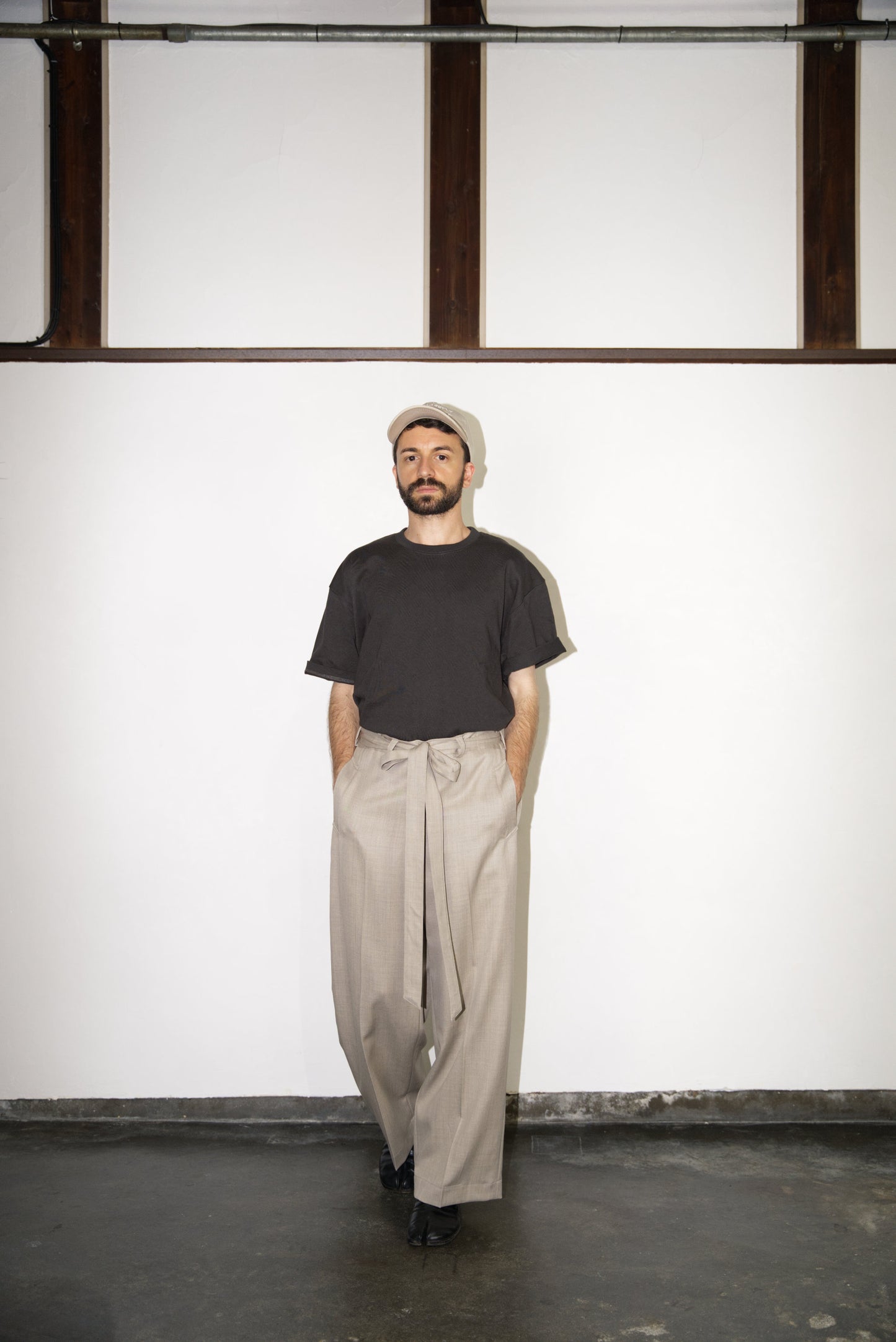 Belted Wide Flare Trousers in Wool from the front