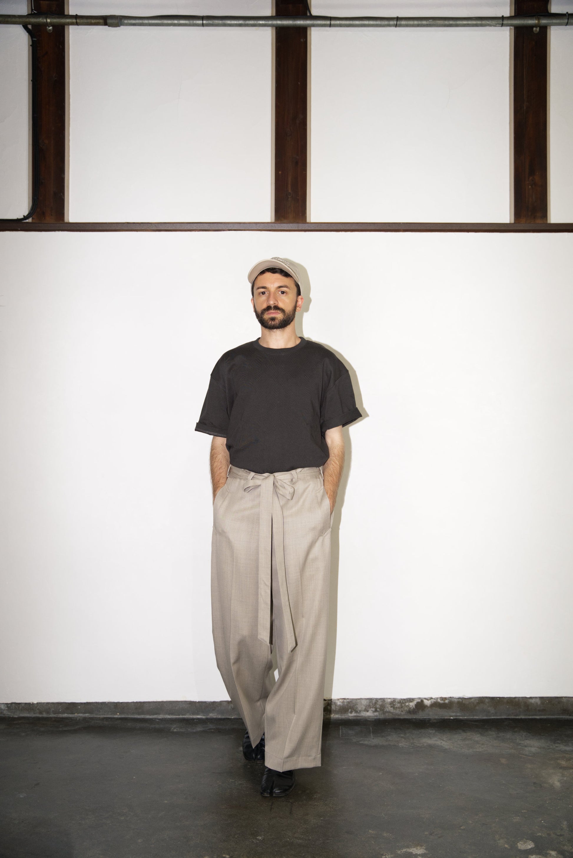 Belted Wide Flare Trousers in Wool from the front
