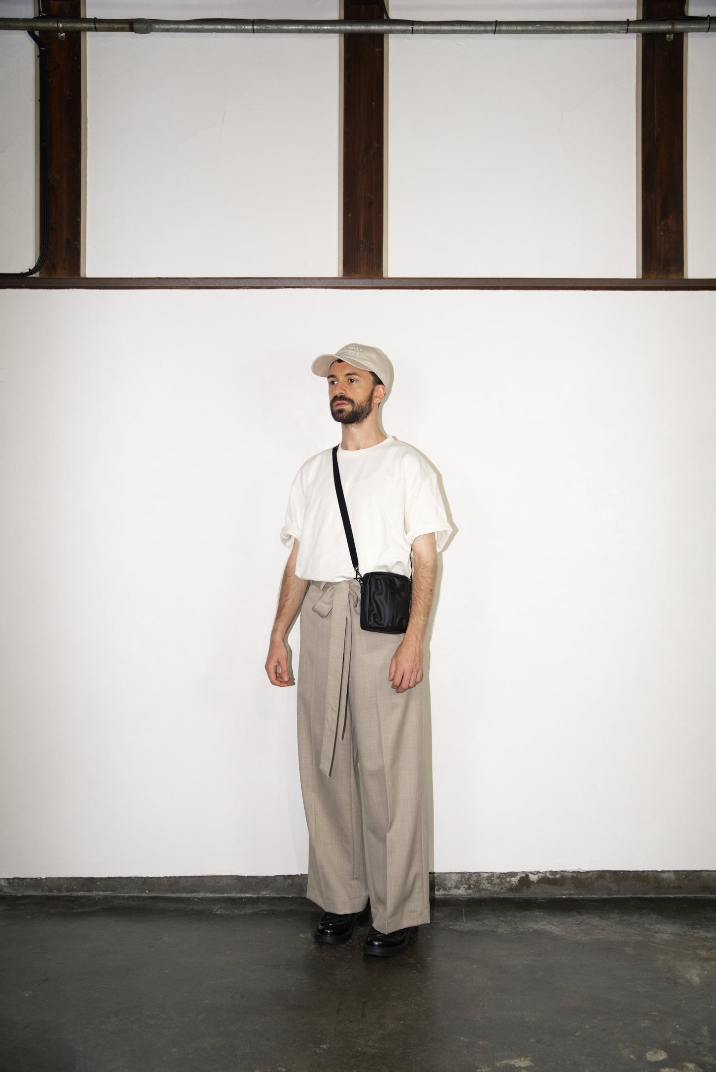 black BOX Cactus Leather Mini Bag on male model