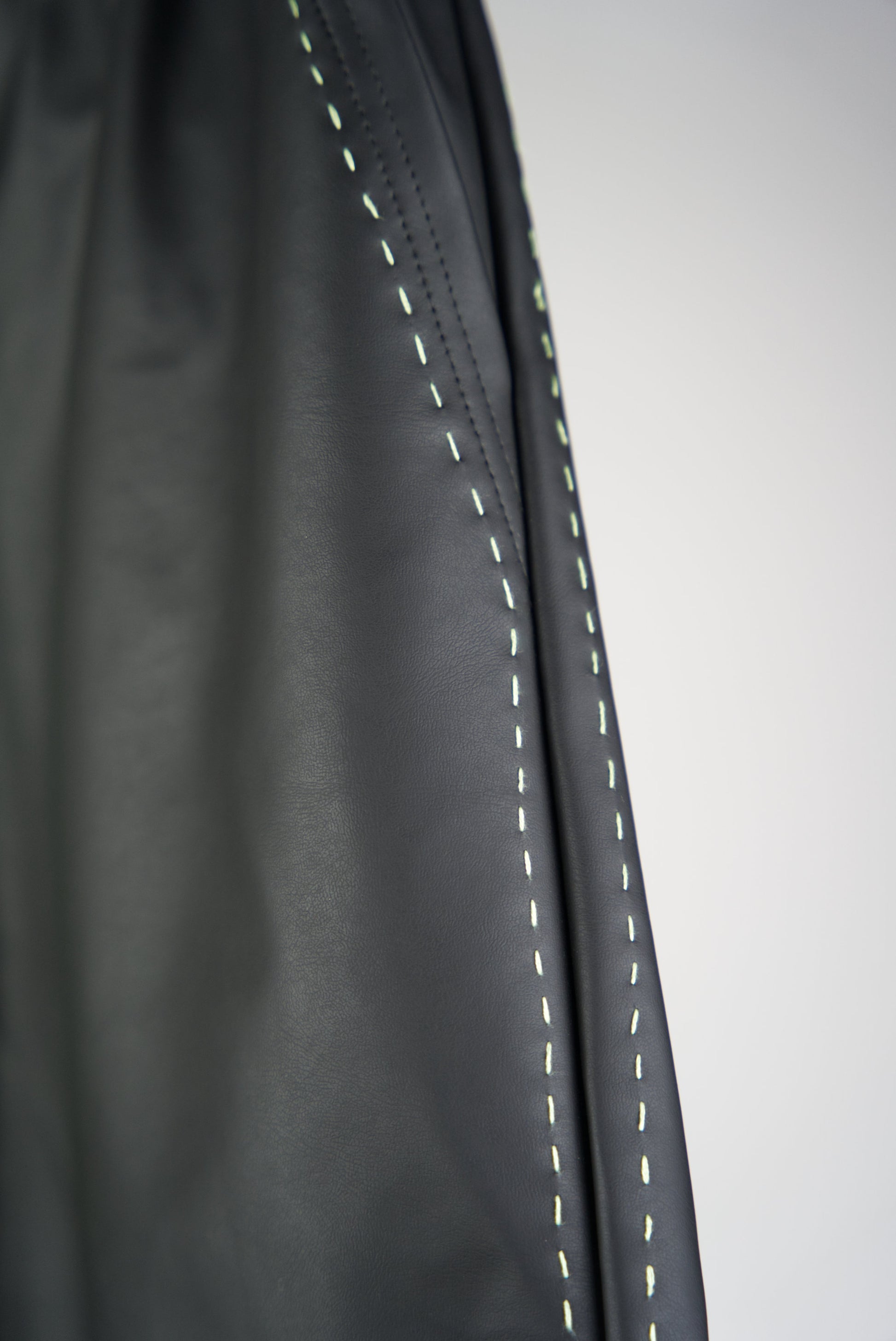 neon green hand-stitched details on the scene cactus leather shorts