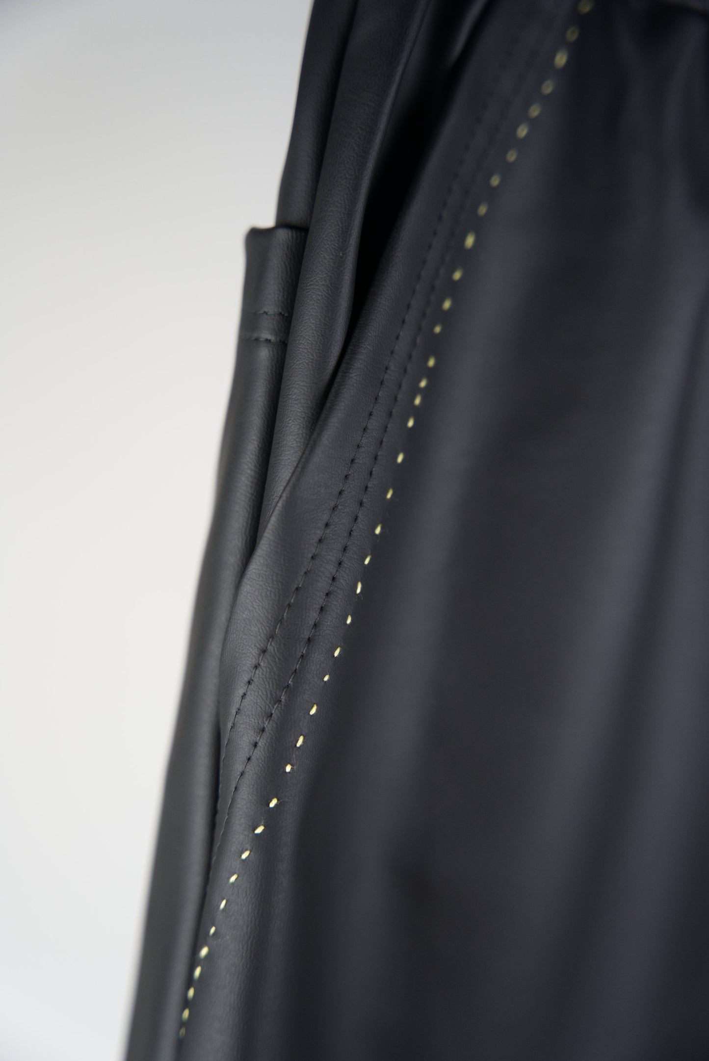 details on the hand-stitched scene cactus leather shorts in neon yellow