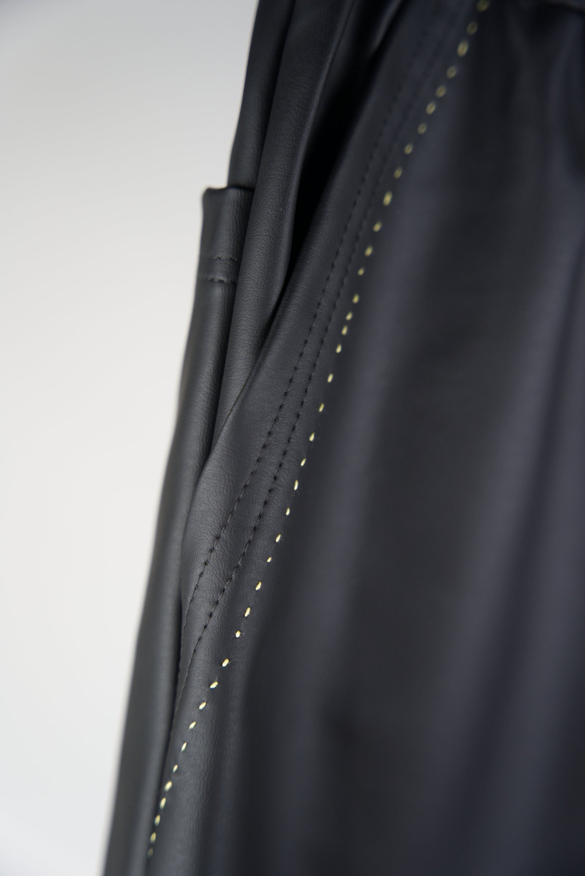 details on the hand-stitched scene cactus leather shorts in neon yellow