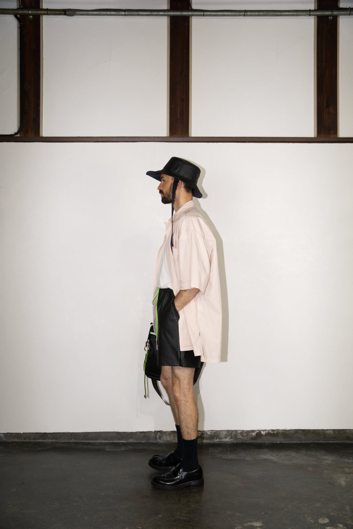matt black color of the hand-stitched neon green scene cactus leather shorts