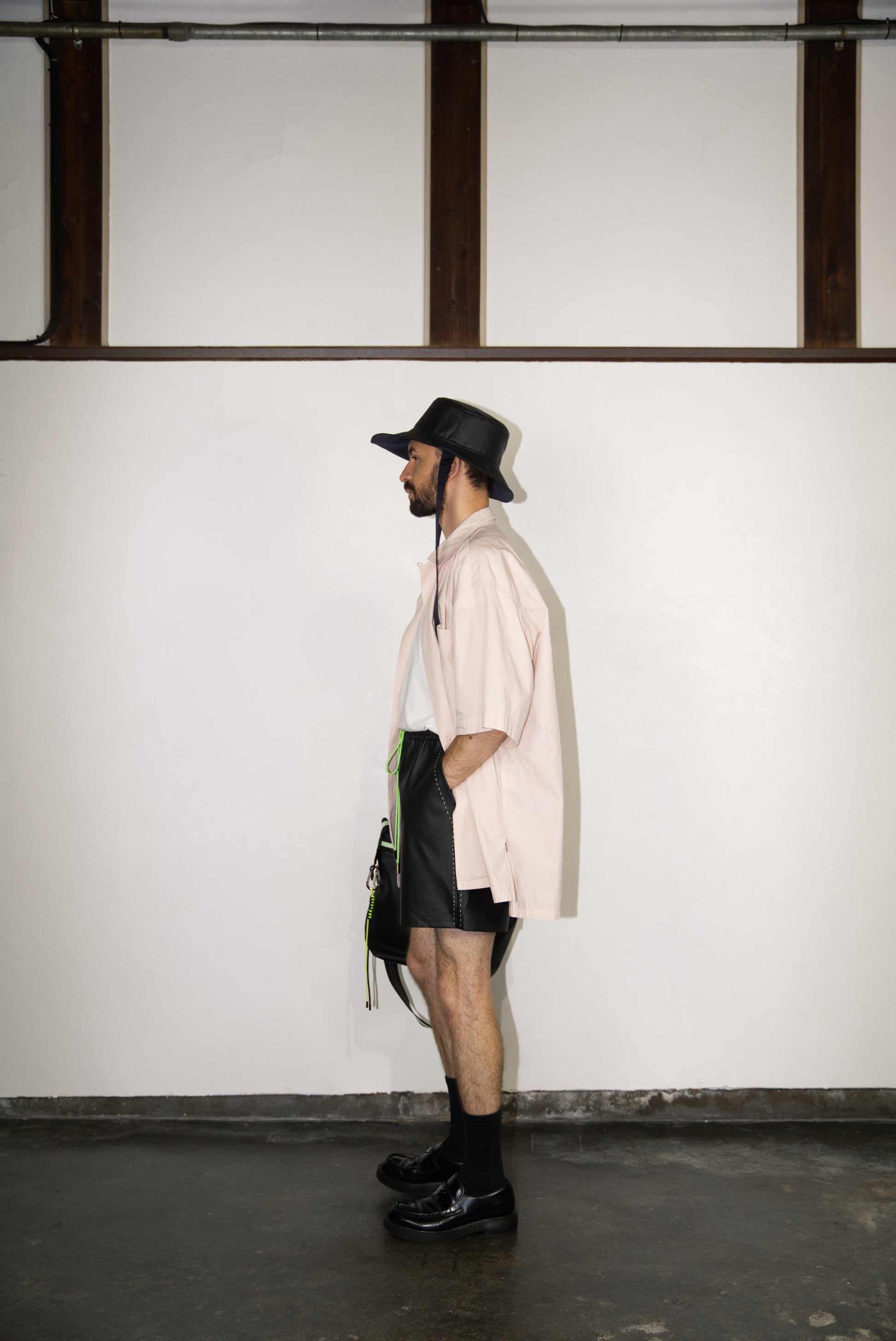 matt black color of the hand-stitched neon green scene cactus leather shorts