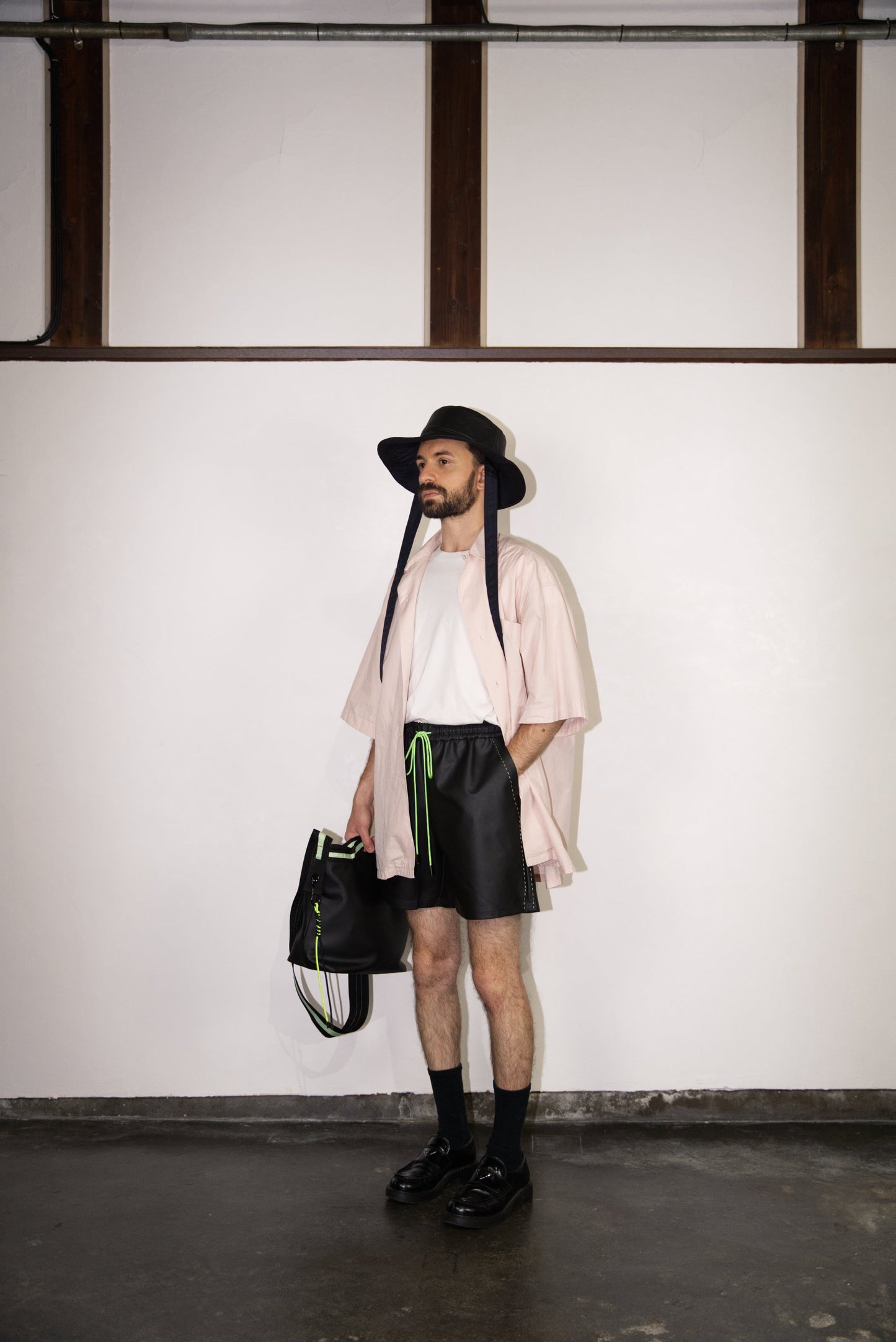 Hand-Stitched SCENE Cactus Leather Shorts in neon green from the side