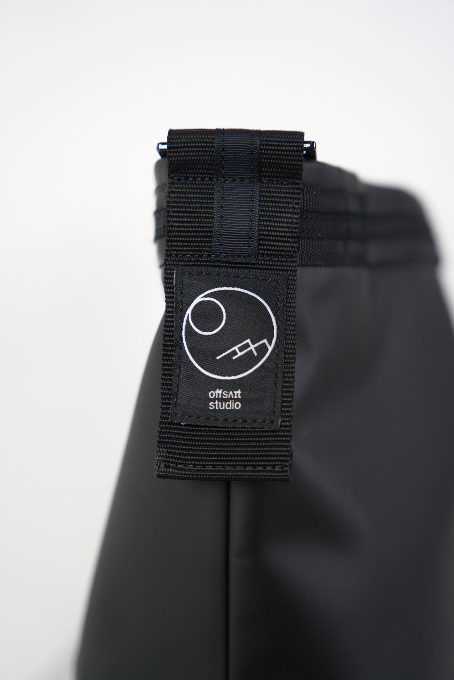 Large Helmet Bag in Cactus Leather details with the offsait studio logo