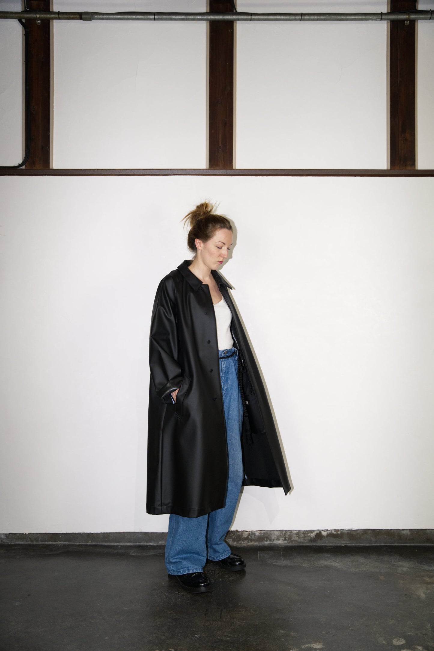 side view of the matt black bal collar coat in cactus leather
