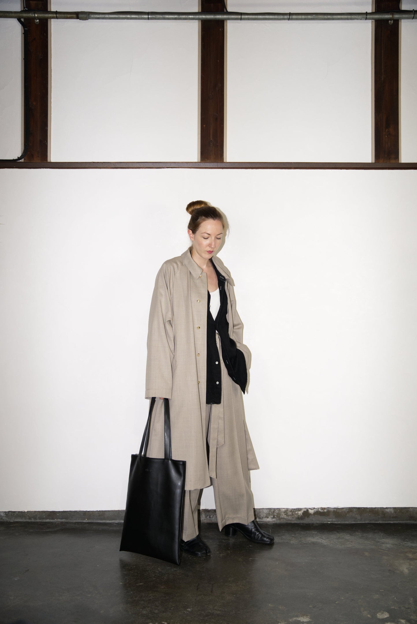 female model carrying the VOID Tote Bag in Cactus Leather