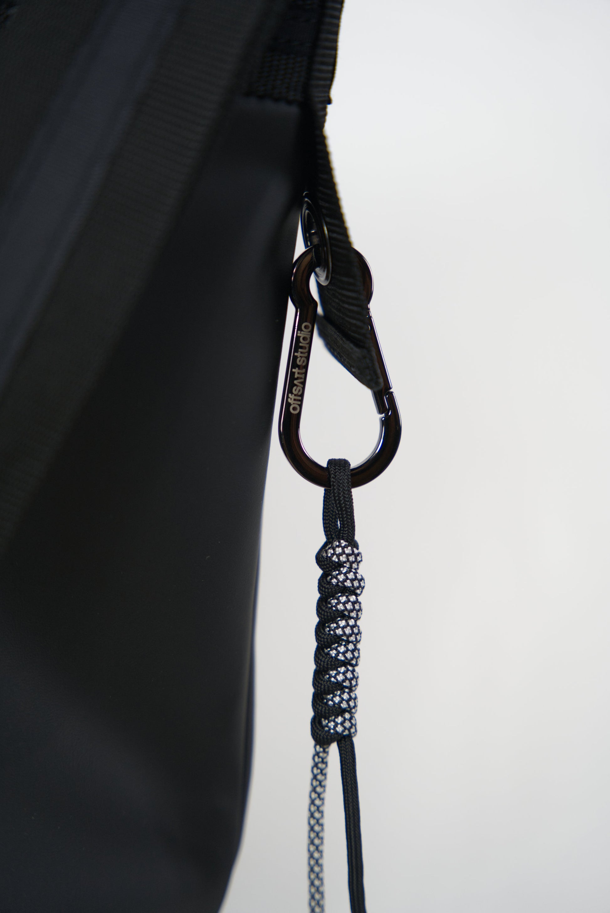 Large Helmet Bag in Cactus Leather details with black metal carabiner and the offsait studio logo 